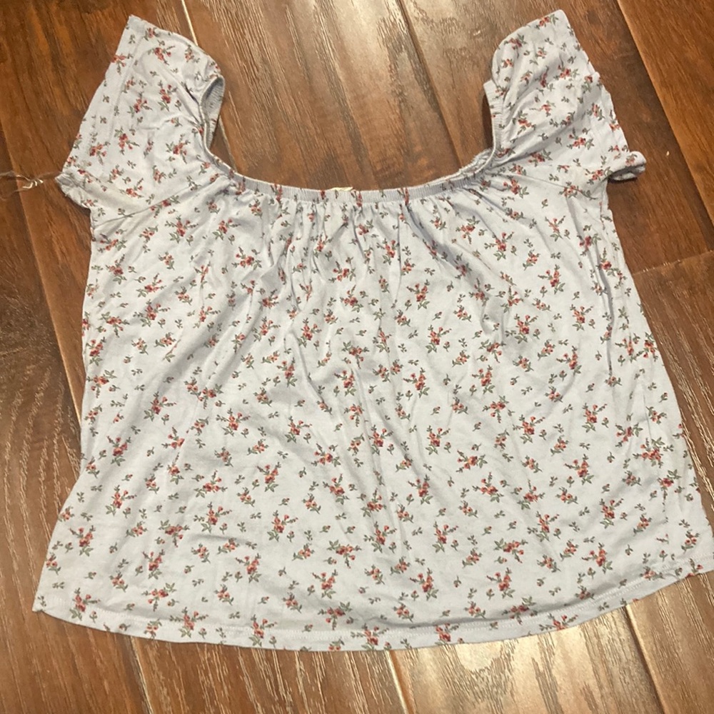 Garage blue with floral pattern top